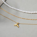 Wholesale autumn/winter sweater necklaces: european and american cross-border jewelry, women's light luxury layered necklaces, versatile high-end pearl necklaces