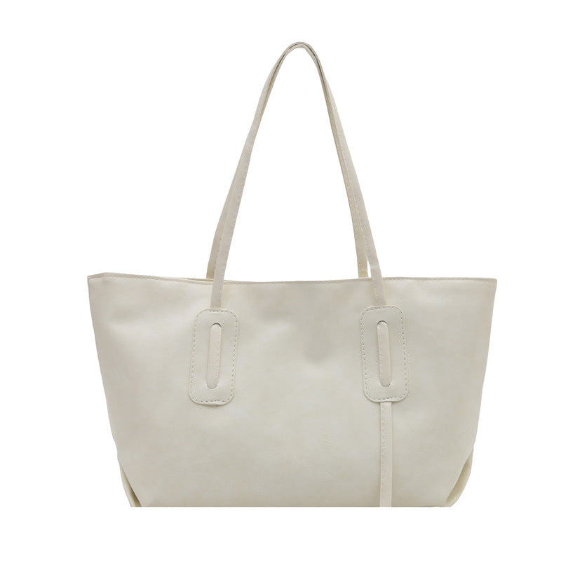 Retro fashion large capacity 2025 casual solid color new commuter retro soft surface tote underarm shoulder bag