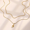 Fashionable, understated luxury: a delicate, double-layered teardrop titanium steel necklace for women. a versatile, minimalist collarbone chain that's trendy, stylish, and fade-resistant