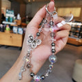 Classy heavy industry diamond-encrusted butterfly pendant colorful round beads ins style crystal beaded bag wrist style mobile phone chain