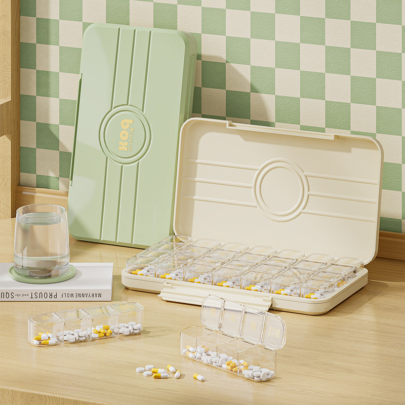 Portable and portable medicine box seven days a week, small medicine dispenser, large character mini medicine reminder box for the elderly