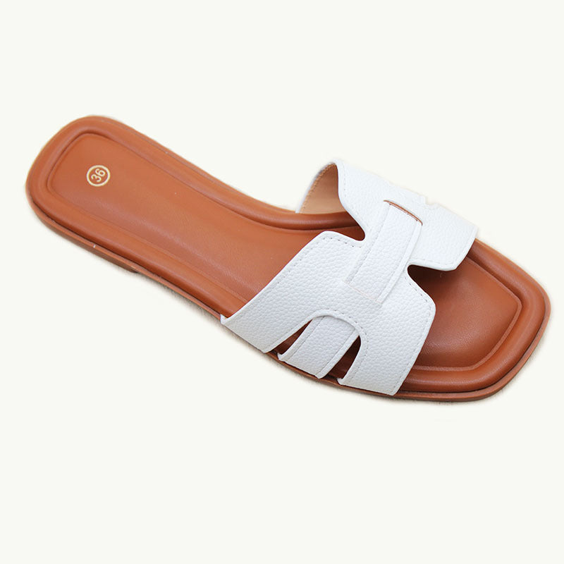 Hot selling Wholesale spot flat slippers women's beach shoes versatile fashion one-character sandals