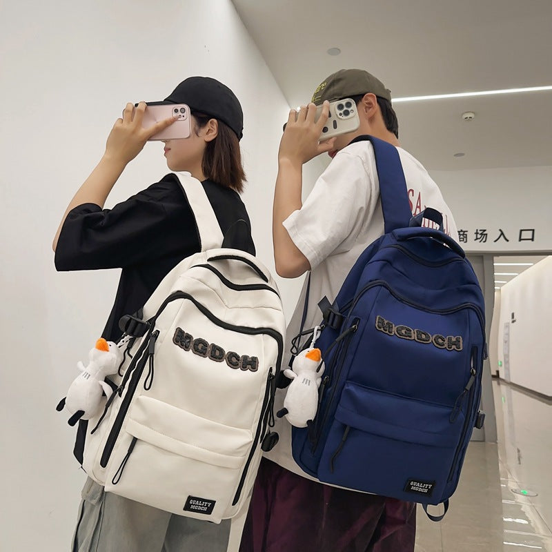 New schoolbag male college students large capacity high school junior high school students fashion versatile casual wear-resistant backpack letter bag