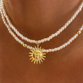 Wholesale autumn/winter necklaces: european & american cross-border jewelry, light luxury, high-end, unique, retro smiley face sun pearl choker