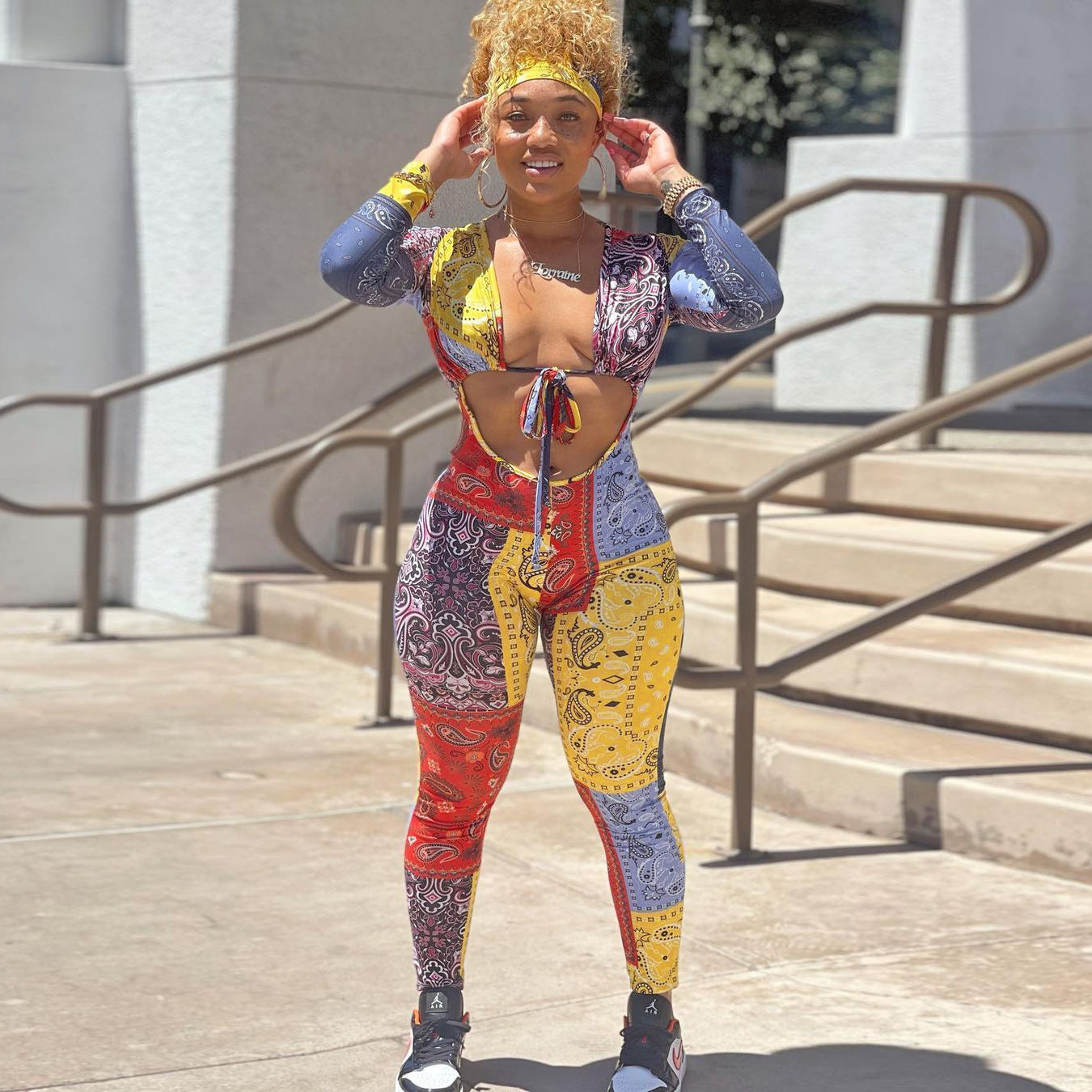 S390187 European and American women's clothing wholesale sexy slim print hollow strap one-piece trousers pencil trousers women