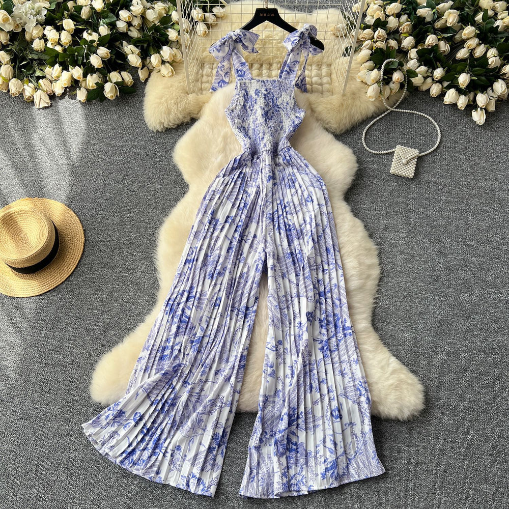 Women's summer jumpsuit for travel & vacation: stretchy, ruched, cinched waist, floral print, spaghetti strap, wide leg, long pants, beachwear