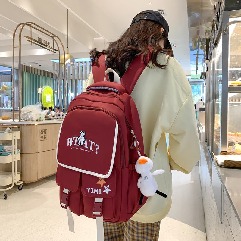 School bag for female junior high school students, large-capacity Japanese backpack for primary school students, third to ninth grades to reduce the burden and protect the spine, fashionable backpack
