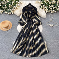 Heavy-duty beaded and gold-stamped lantern sleeve a-line dress for women, perfect for spring. features a cinched waist for a slimming effect, elegant and subtly luxurious design, and a full, flowing skirt