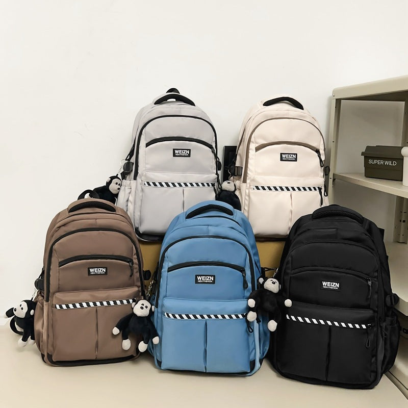 School bag male large capacity junior high school student middle school student fashion trend simple backpack female business travel bag