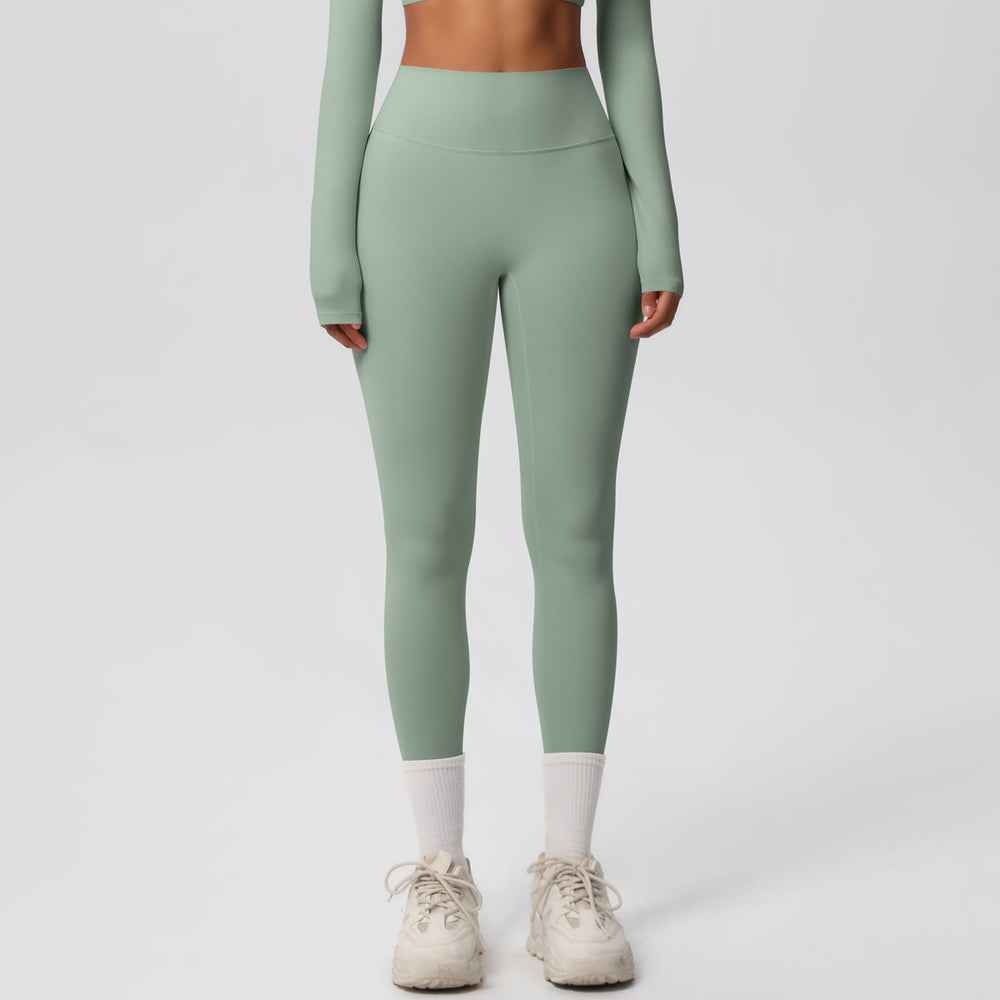High-waisted, brushed nylon yoga pants with a cloud-like feel, designed for outdoor sports. these compression leggings are quick-drying and perfect for running and fitness. custom manufacturing available