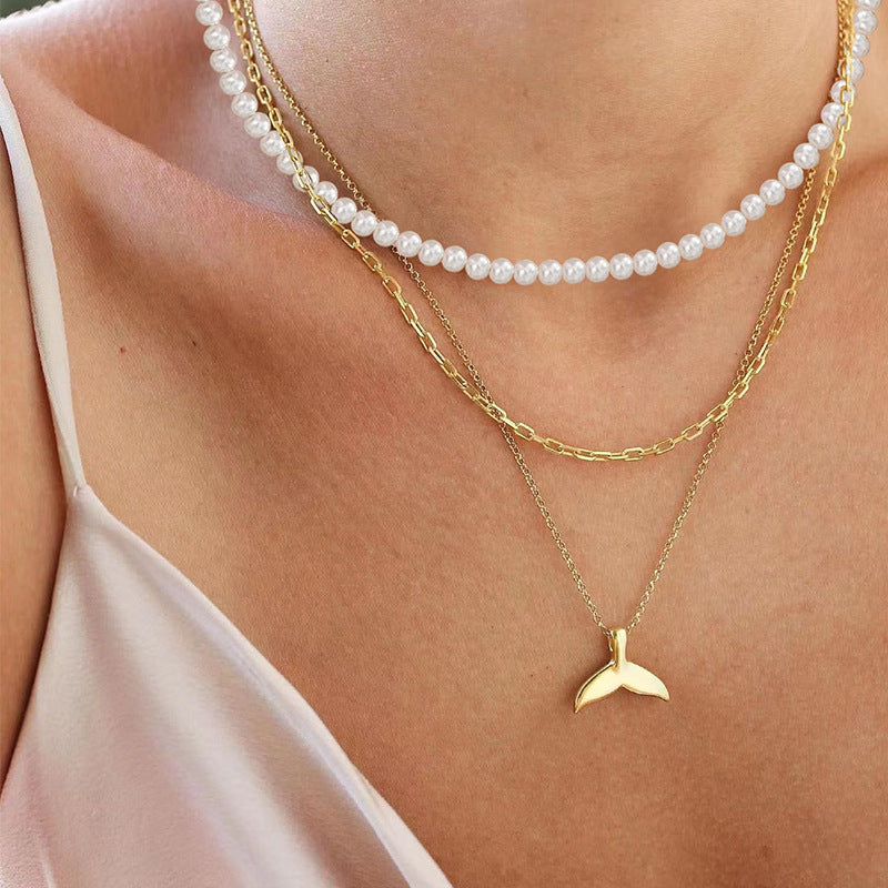 Wholesale autumn/winter sweater necklaces: european and american cross-border jewelry, women's light luxury layered necklaces, versatile high-end pearl necklaces