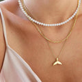 Wholesale autumn/winter sweater necklaces: european and american cross-border jewelry, women's light luxury layered necklaces, versatile high-end pearl necklaces