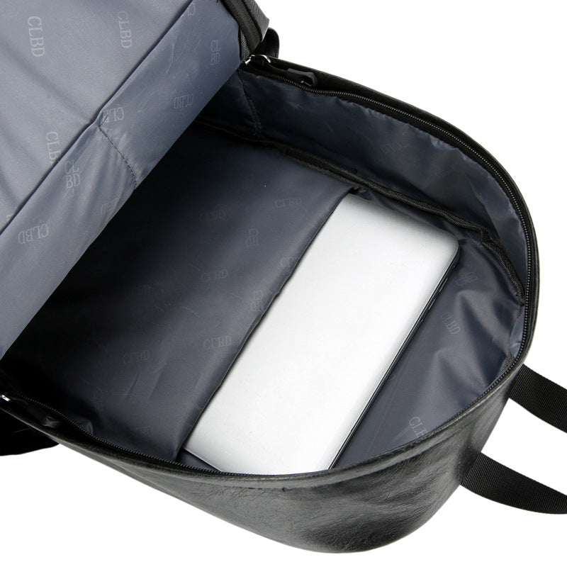 New business Korean version of junior high school students backpack men's large capacity simple PU outdoor travel computer backpack