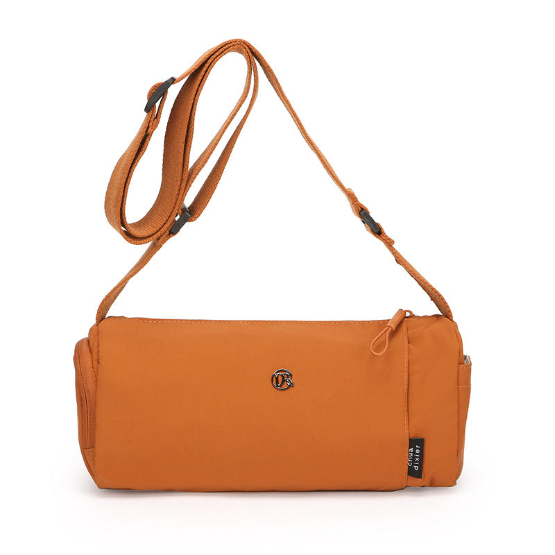 Simple Japanese shoulder bag women's nylon anti-splashing cylinder pillow bag trendy cool messenger bag commuter portable handbag