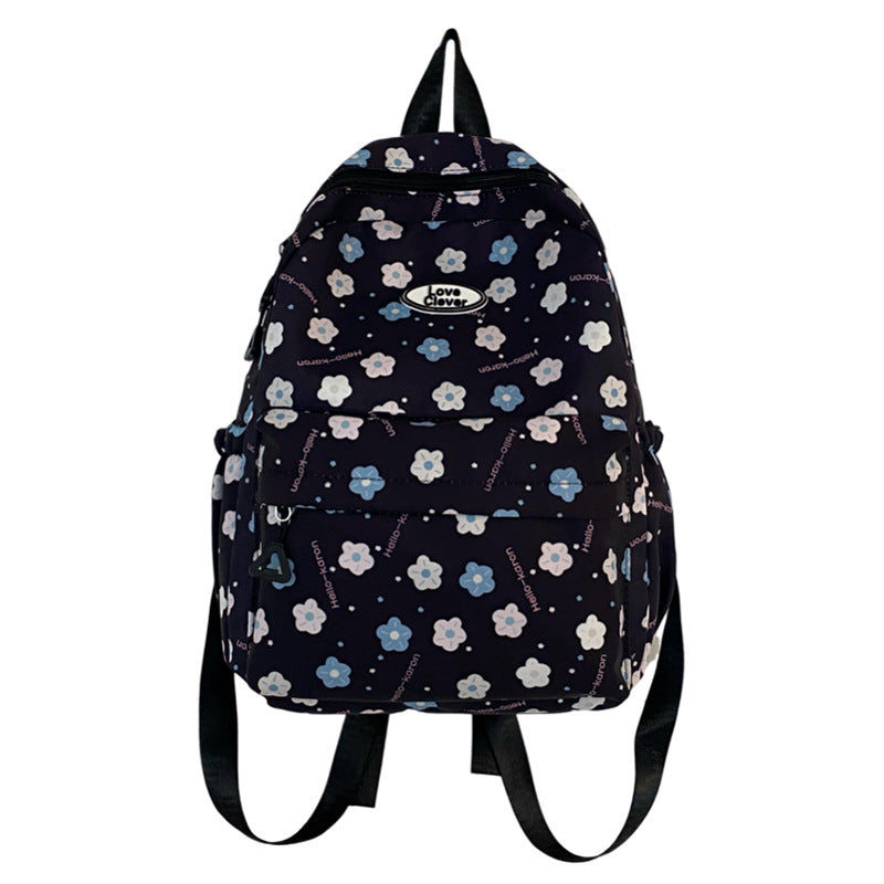 Niche original floral design schoolbag high value large capacity lightweight versatile backpack travel attendance backpack