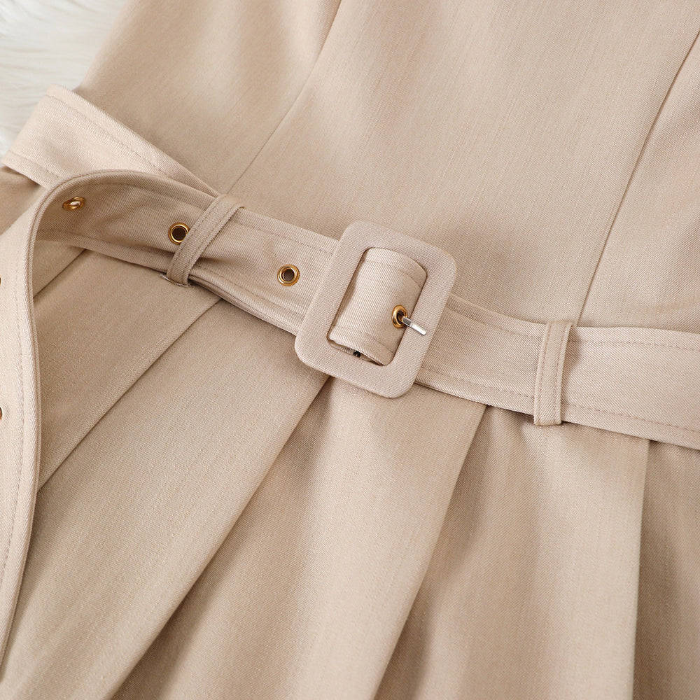 Women's sleeveless pleated mini dress with cinched waist, round neck, and belt – a chic and versatile work-ready style