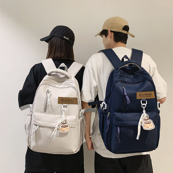 Elementary school students backpack casual backpack junior high school students large capacity schoolbag female college students go out portable computer bag