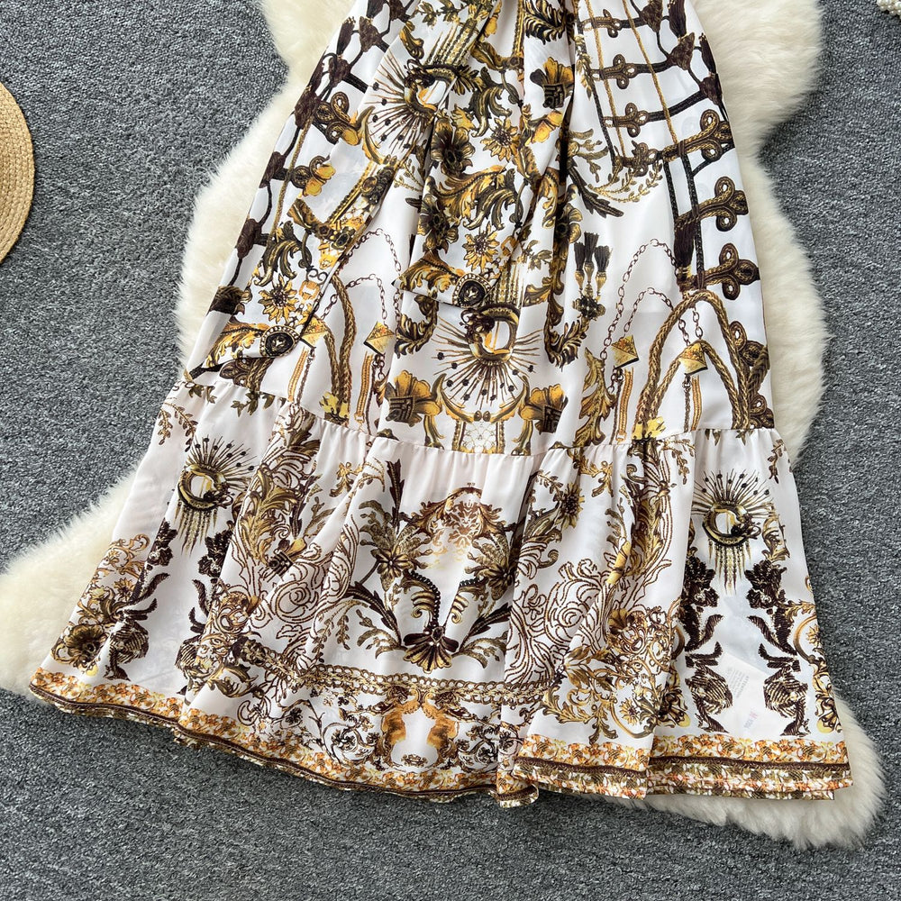 Bohemian vacation style retro deep v-neck tie-up sleeveless cinched waist elegant printed ruffle hem dress