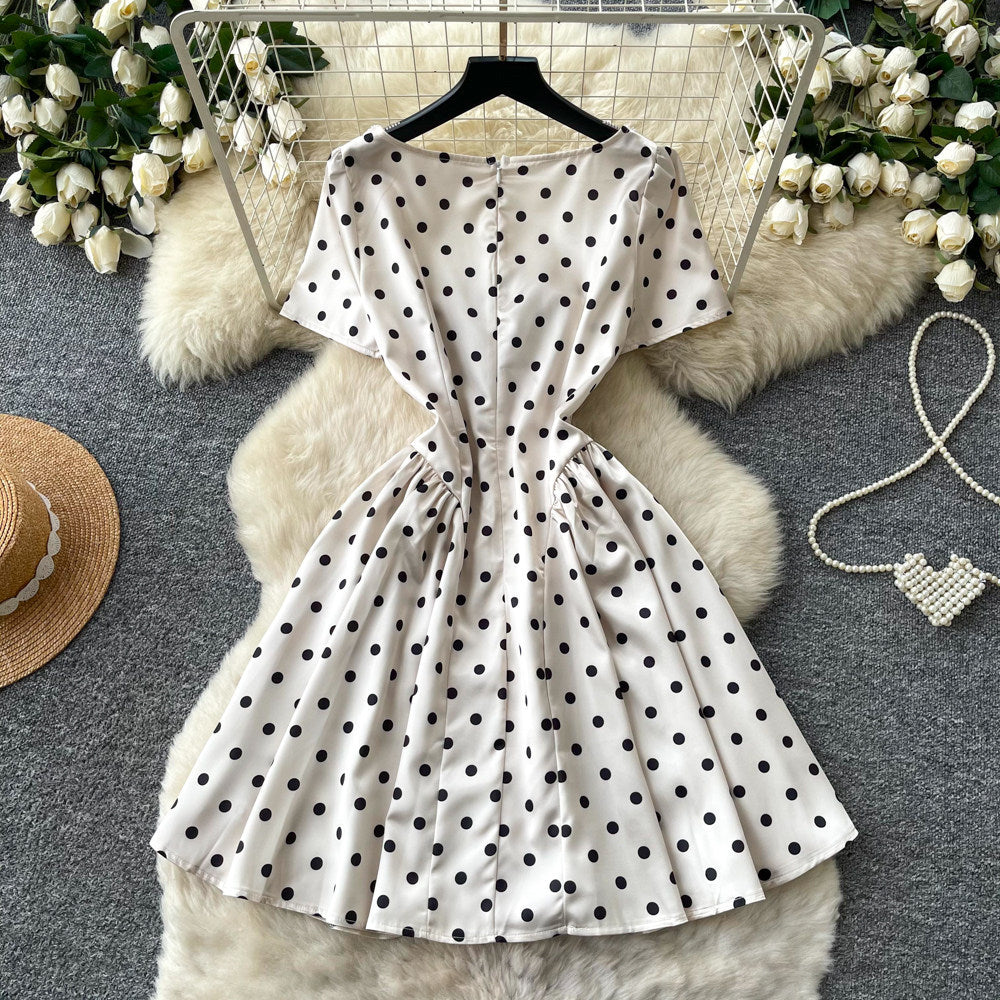 French chic polka dot dress - effortless summer style: square neck, cinched waist, slimming a-line for petite figures