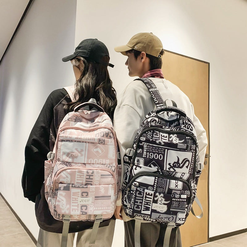 New large-capacity Korean version of middle school students, junior high school backpacks, men's fashion trend graffiti schoolbags, women's strong backpacks