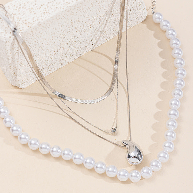 European and american cross-border e-commerce new jewelry exaggerated pearl layered necklace personalized irregular alloy diamond pendant for women