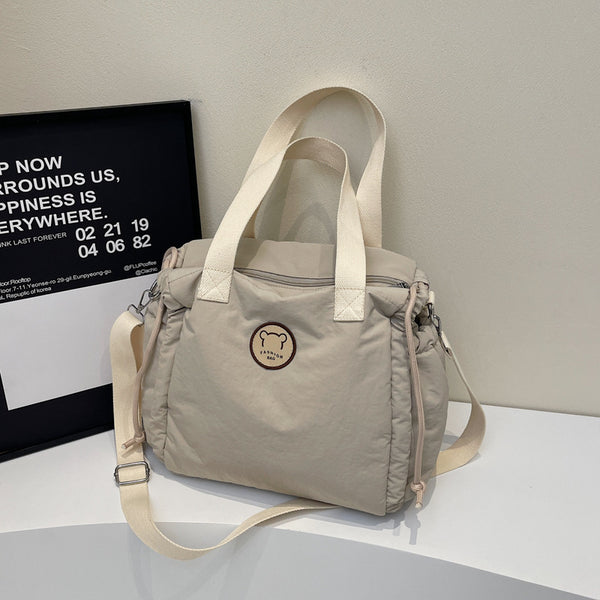Cross-border fashion messenger handbag women's trend versatile lightweight cloth casual shoulder handbag commuter women's bag