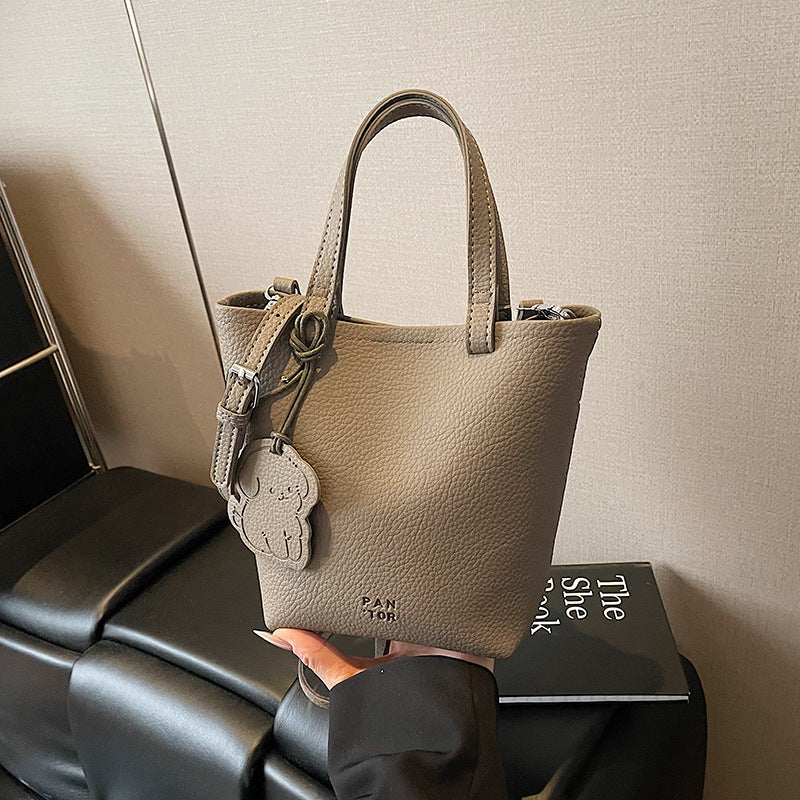 Cross-border simple casual portable bucket bag women's 2025 new fashion shoulder bag commuter versatile messenger bag