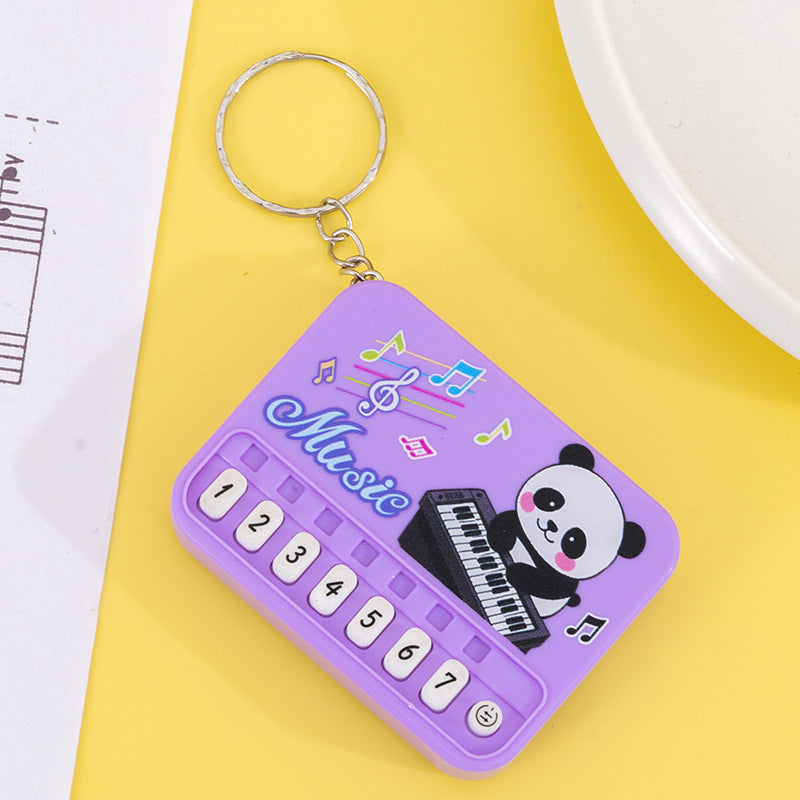 Mini pocket piano kids electronic keyboard - playable, light-up, creative, high-value keychain charm toy