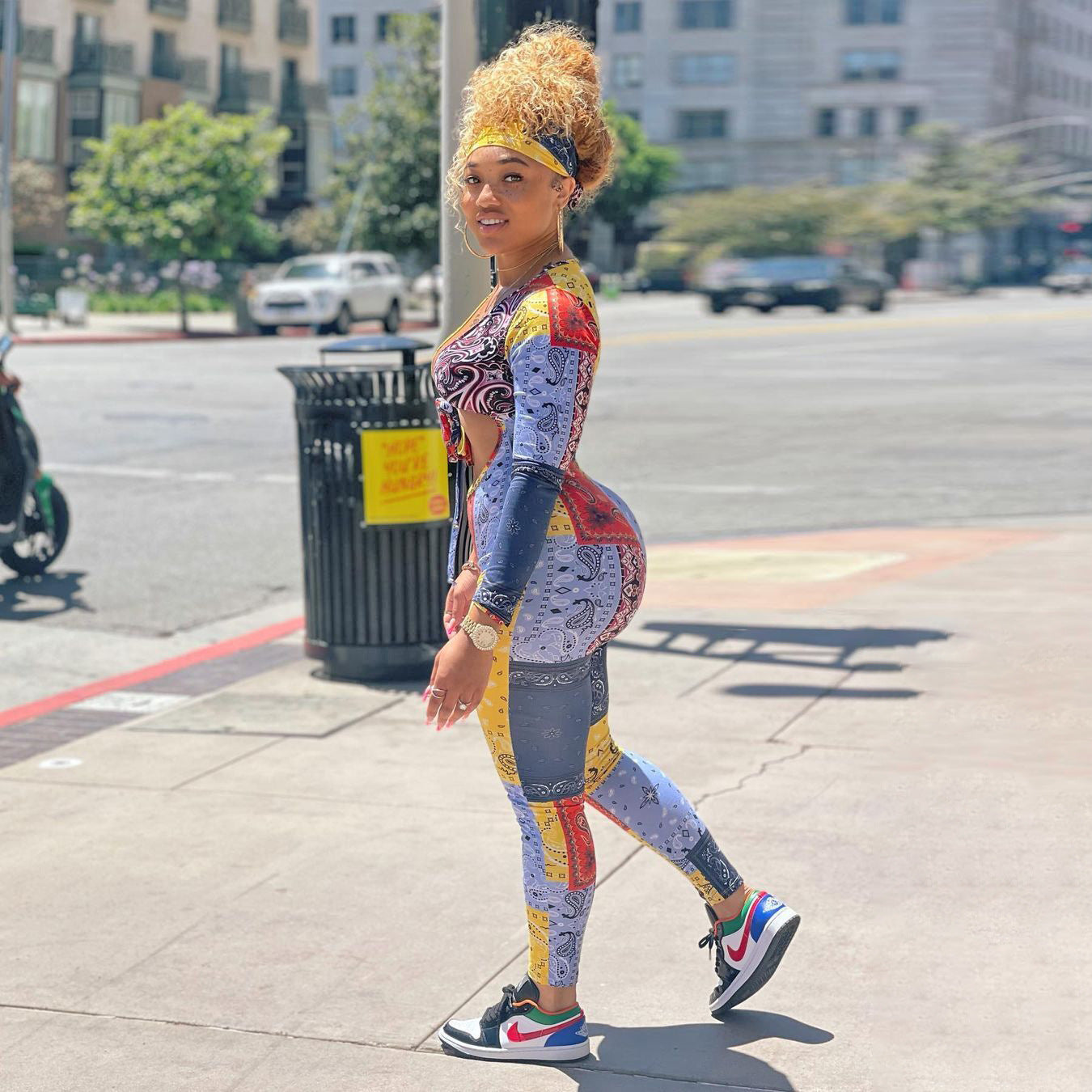 S390187 European and American women's clothing wholesale sexy slim print hollow strap one-piece trousers pencil trousers women