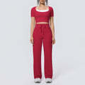 Fake two-piece sports short-sleeved yoga suit with chest pad, drawstring wide-leg straight-leg pants, quick-drying running fitness suit