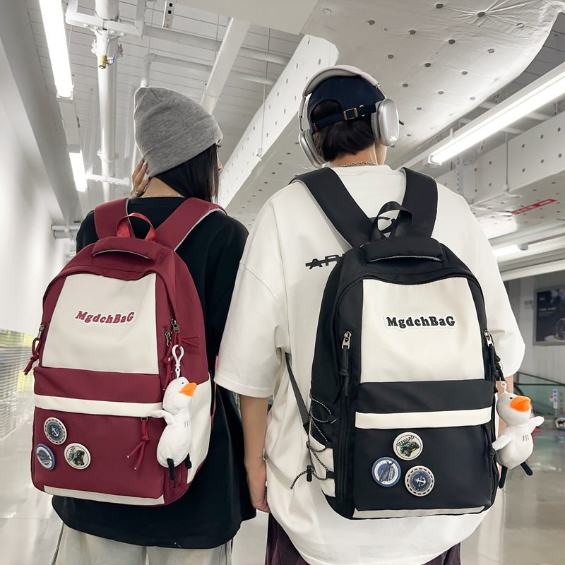 Large capacity casual backpack schoolbag male and female high school junior high school student schoolbag primary school student college student wholesale