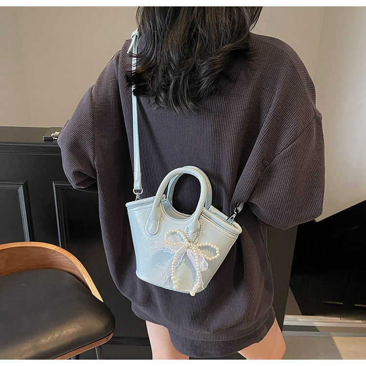 Cross-border texture contrasting handbag bag 2025 new fashionable versatile foreign gas bucket bag casual simple messenger bag
