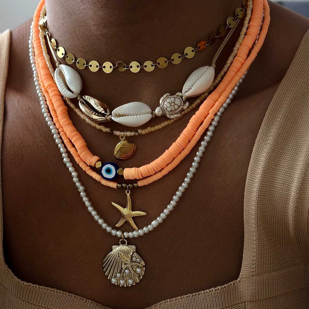 Wholesale seaside necklaces: european and american cross-border ocean-inspired statement jewelry featuring exaggerated shell pendants, light luxury, niche designs, and dyed crushed stone accents for women