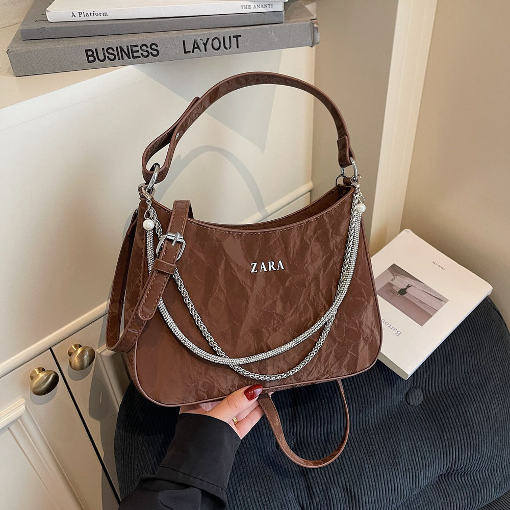 High-end women's bag, large capacity, 2025 new style, niche design, shoulder bag, crossbody bag, understated luxury, textured, commuter tote bag