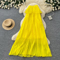 Vacation-ready yellow tube top sexy dress for women, featuring a ruffled halter neck design, a unique and stylish french-inspired long dress perfect for summer
