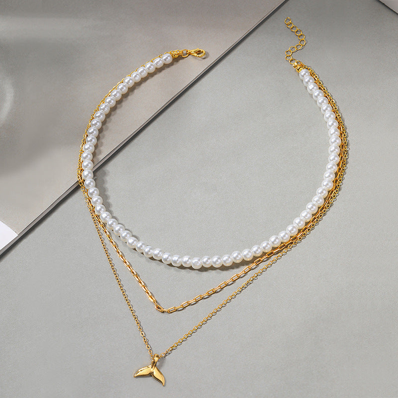 Wholesale autumn/winter sweater necklaces: european and american cross-border jewelry, women's light luxury layered necklaces, versatile high-end pearl necklaces