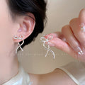 Minimalist chic: subtle bow earrings - a1856 sterling silver