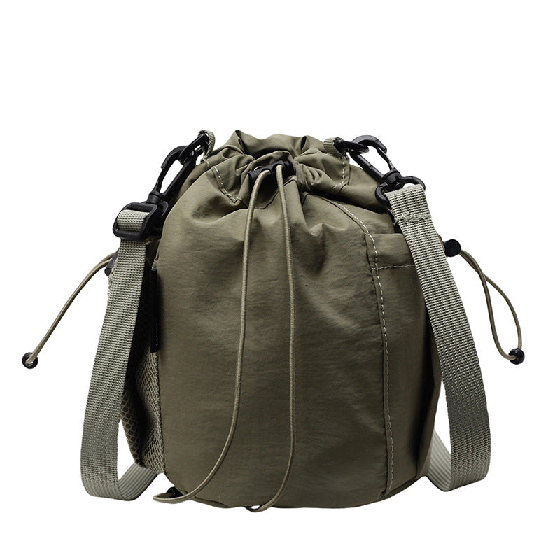 New drawstring bundle hand carry bucket bag  simple casual versatile shoulder bag outdoor commuter messenger women's bag