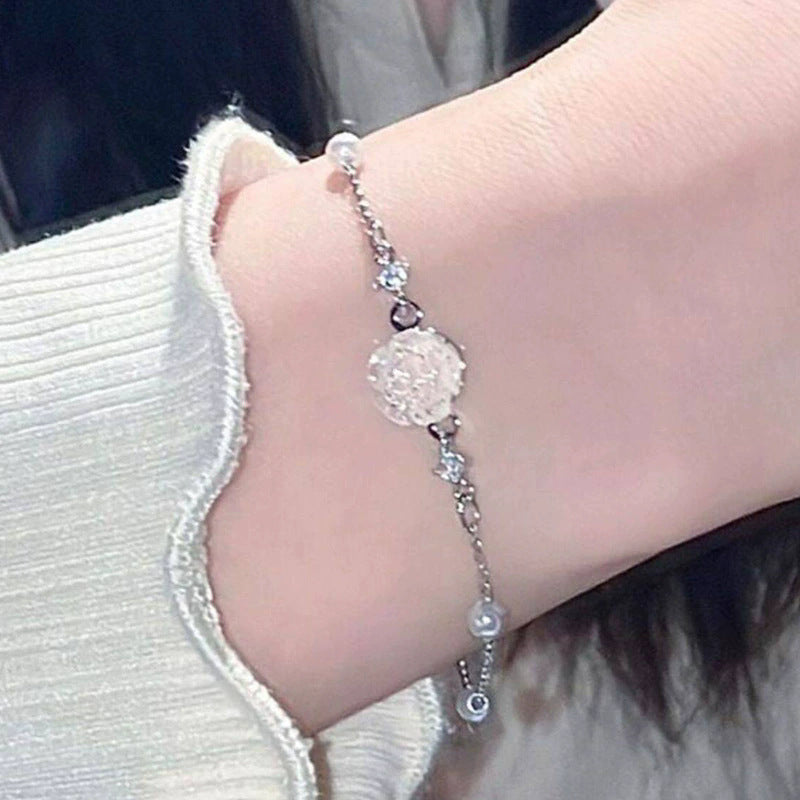 French camellia pearl bracelet for women, 2026 new arrival, light luxury niche style, lightweight luxury fashionable versatile hand jewelry