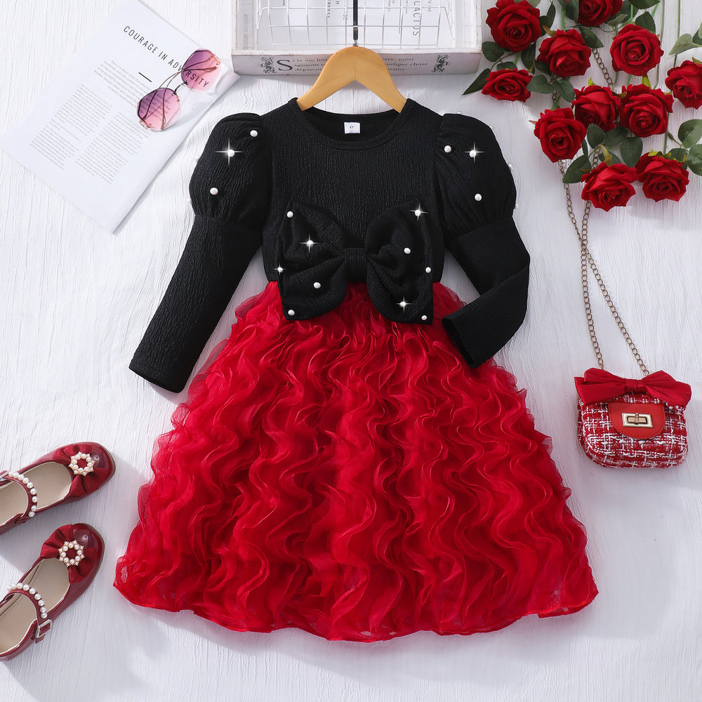 Girls' dress for toddlers and young children, featuring a large bow, pearl embellishments, and a 3d wavy tulle skirt