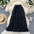 Korean style high-waisted a-line midi skirt with tassel detail - versatile work skirt for autumn