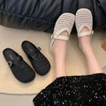 Trendy and versatile closed-toe mules, perfect for wearing out. new 2025 summer collection of breathable, hollow-out flat sandals and slippers for women, available wholesale
