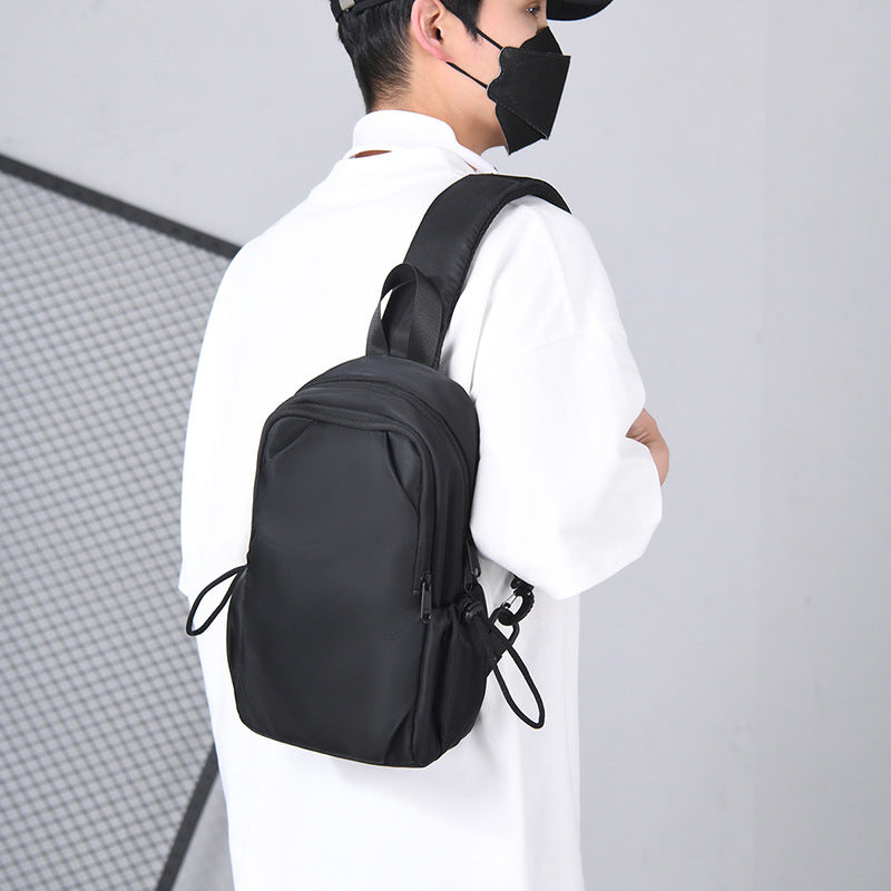Fashion trendy cool messenger bag men's breast bag large capacity lightweight anti-splashing fabric chest backpack casual shoulder bag