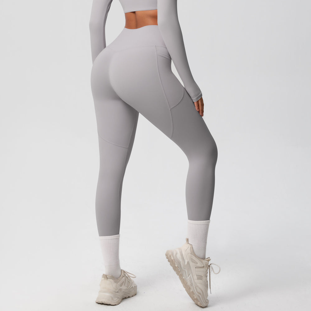 new arrivalhigh waist hip lifting tight yoga pants nude quick-drying flap pocket pants outdoor running fitness sports pants