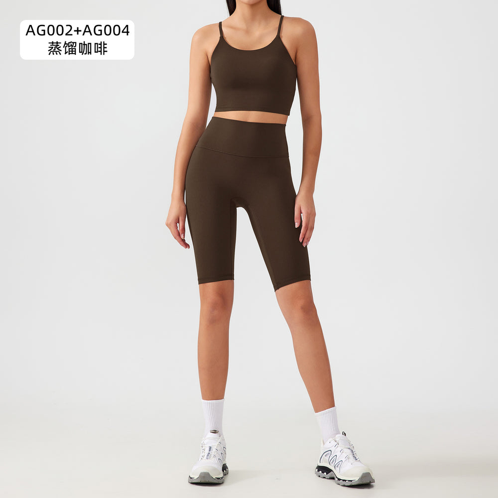 Two-piece yoga outfit set for women: high-waisted, butt-lifting yoga shorts with barely-there, supportive, shock-absorbing sports bra