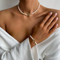 Trendy and versatile irregular pearl necklace and bracelet set – a sweet and sophisticated design with a heart motif. hot-selling cross-border jewelry