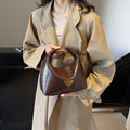 Commuting classy sense super popular hand bag women 2025new arrivaleasiest for match dumpling bag fall and winter maillard shoulder crossbody bag