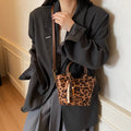 Super hot retro fashion bucket bag 2025 autumn niche design leopard print elegant handbag trendy versatile shoulder bag