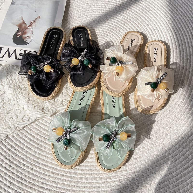 Fairy-style women's flat sandals, non-slip, perfect for summer 2024. featuring a bow detail, ideal for the beach or everyday wear
