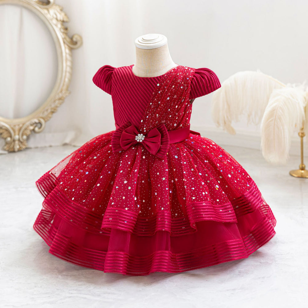 Ready-to-ship wholesale sequin bow princess dresses for girls, perfect for baby's first birthday or special occasions